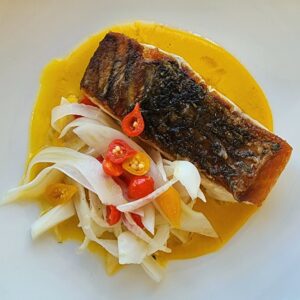 Indigo Oscar's barramundi with yellow pepper sauce